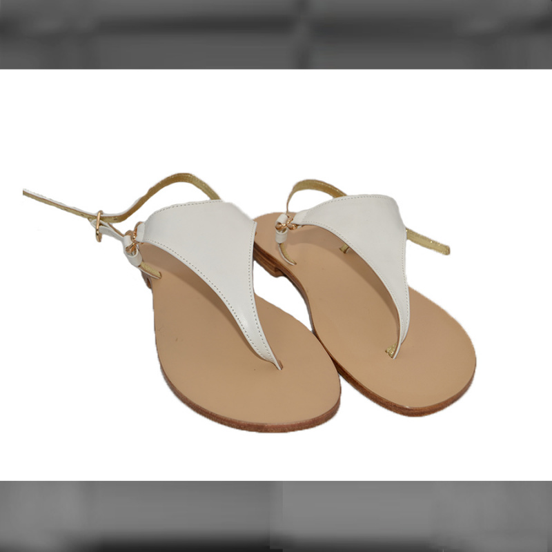Sandali bianchi Capri con suola e decorazione in cuoio